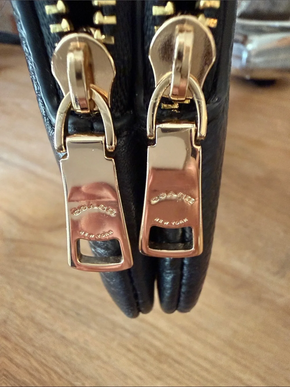 Coach Black Pebbled Leather Wristlet with Gold Logo